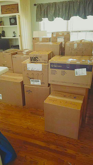 moving boxes stacked on floor