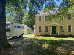 moving truck in driveway