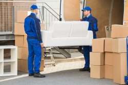 movers carrying couch