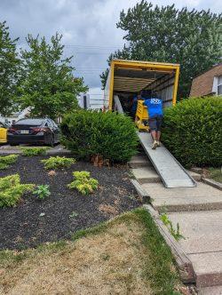 workers loading stuff into truck