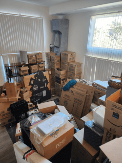 moving boxes stacked in a corner