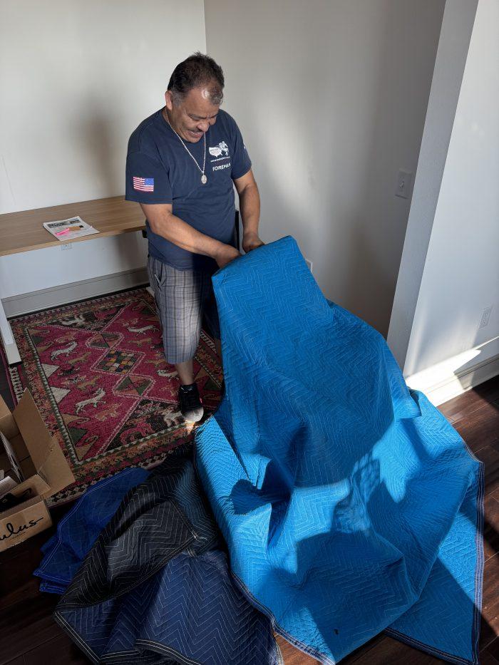 BLVD Moving crew wrapping furniture for Dana's move