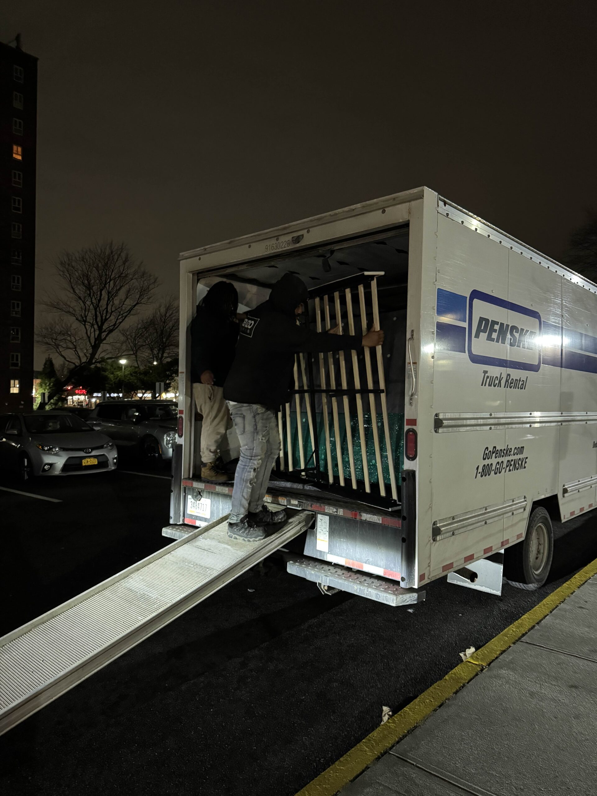 [Instant Movers LLC trailer drop-off/pickup photo in Queens, NY]